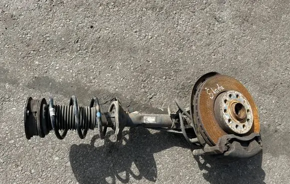 Skoda Octavia Mk3 (5E) Front wheel hub spindle knuckle 5q0413023
