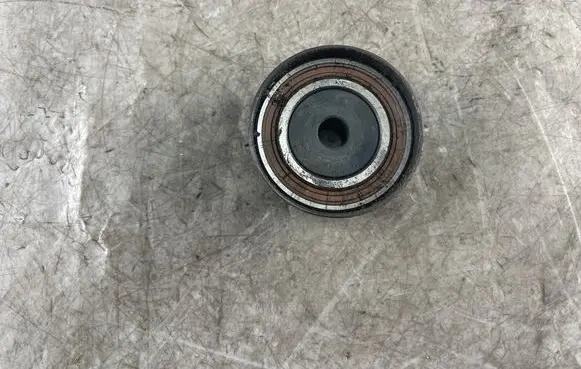 Opel Astra H Belt tensioner pulley 