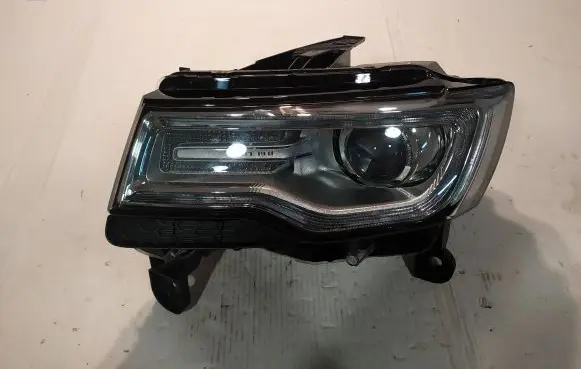 Jeep Cherokee Headlight/headlamp 68144709AB M167608 323510