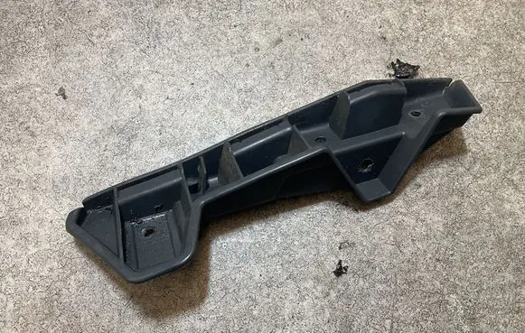 Front bumper mounting bracket