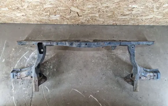 Radiator support slam panel