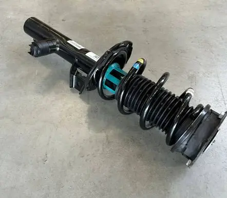 Volkswagen Golf VIII Front shock absorber with coil spring 5WA413032AA 5WA412022HS