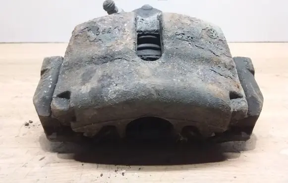 Volkswagen Touran II Front brake caliper