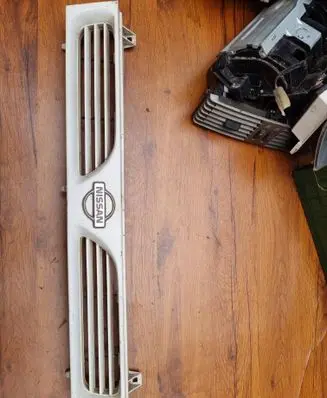 Nissan Sunny Front bumper upper radiator grill 62310 73C00 65C00