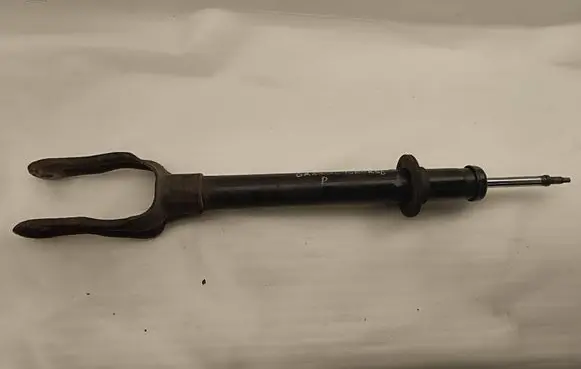 Jeep Grand Cherokee Front shock absorber with coil spring 68029502AD 55553E 1A13999A