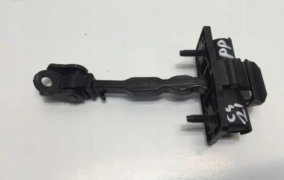 Front door check strap stopper