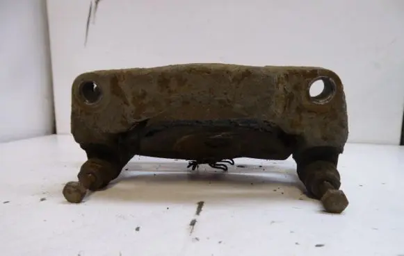 Renault Scenic I Brake caliper pad carrier rear 7701047928
