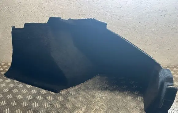 Trunk/boot lower side trim panel