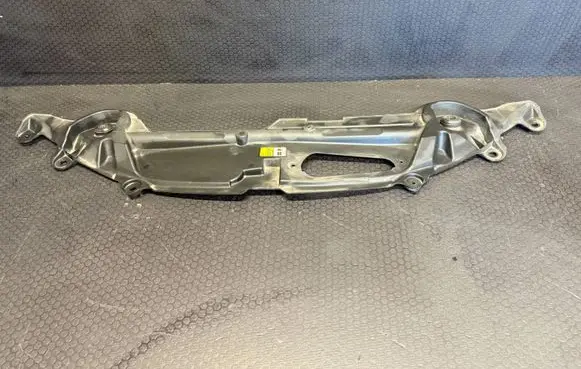 Top upper radiator support slam panel