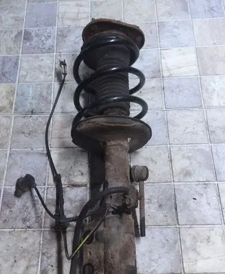 Toyota Avensis T250 Front shock absorber with coil spring