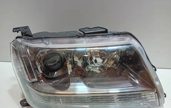 Suzuki Grand Vitara II Headlight/headlamp 3512065J32000 LAMPA LEWA PRZEDNIA