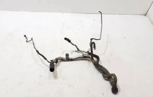 Volkswagen Touareg II Engine coolant pipe/hose 057121071AM