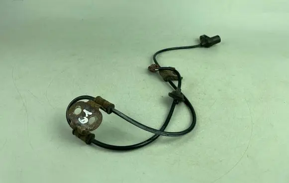 Subaru Legacy ABS brake wheel speed sensor 27540AE030