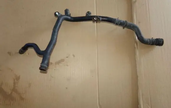 Volkswagen Jetta VI Engine coolant pipe/hose 06A121065DG