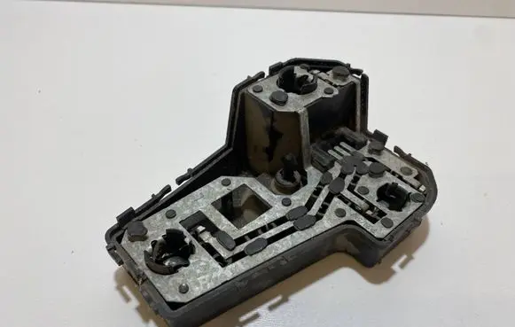 Tail light bulb cover holder