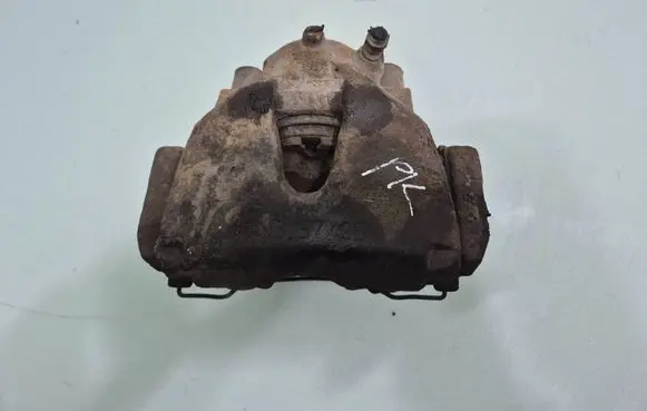 Opel Combo C Front brake caliper 