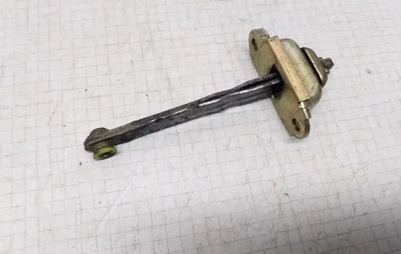 Nissan Terrano Front door check strap stopper
