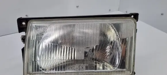 Volkswagen Polo II 86C 2F Headlight/headlamp 303137547