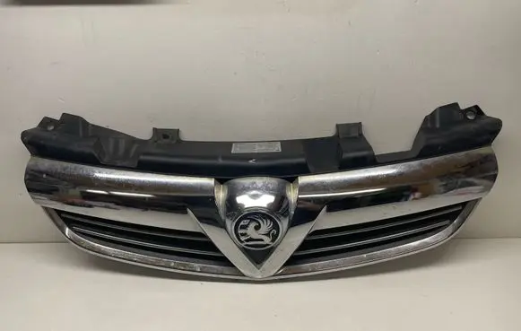 Opel Zafira B Front bumper upper radiator grill 13247328