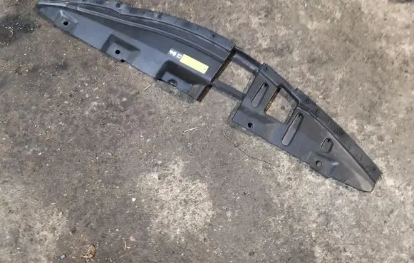 Engine bonnet/hood lock trim molding