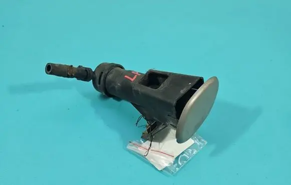 Headlight washer spray nozzle