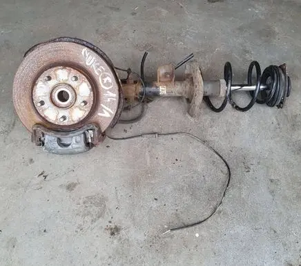 Front wheel hub spindle knuckle