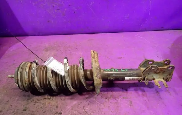 Opel Corsa D Front shock absorber with coil spring 