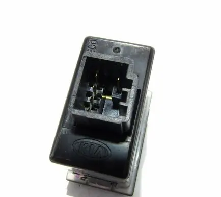 KIA Carens I Headlight level height control switch