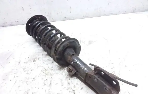 Front shock absorber with coil spring