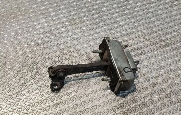 Front door check strap stopper