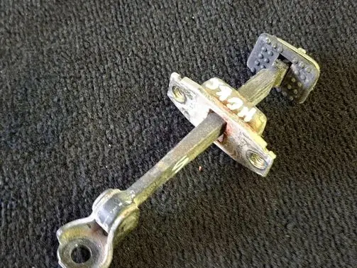Honda Civic Rear door check strap stopper