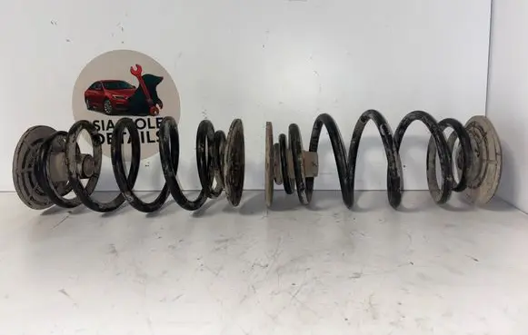 Opel Zafira B Front coil spring 90538498