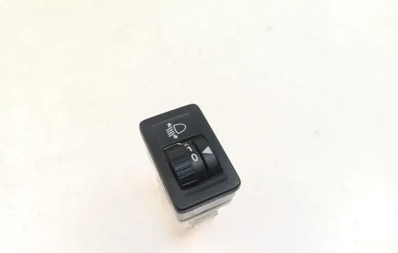 Suzuki Swift I Headlight level height control switch