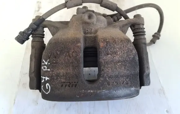 Volkswagen Golf VII Front brake caliper