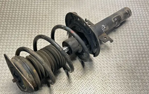 Front shock absorber with coil spring