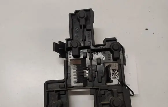 Tail light bulb cover holder