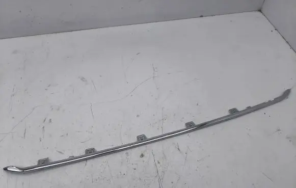 Engine bonnet/hood lock trim molding