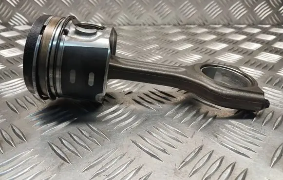 Piston with connecting rod