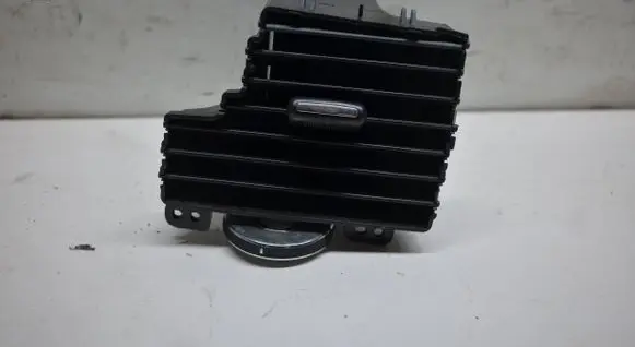 Dash center air vent grill
