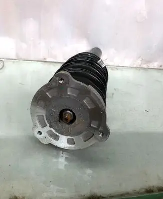 Volvo XC60 Front shock absorber with coil spring 32346002