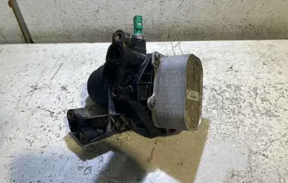 Volkswagen Caddy Oil filter mounting bracket 03N117021