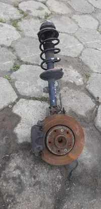 Front wheel hub spindle knuckle