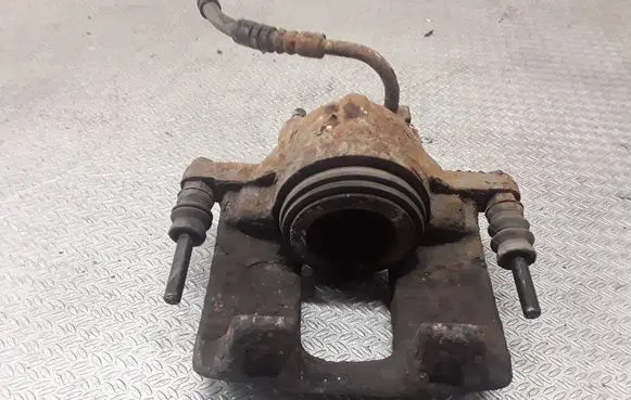 Chrysler Grand Voyager V Front brake caliper 