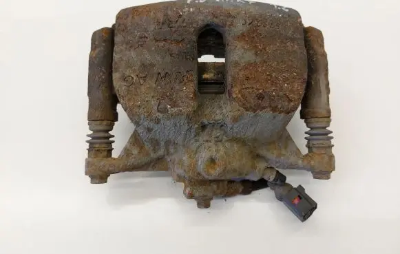 Volkswagen Golf VII Front brake caliper