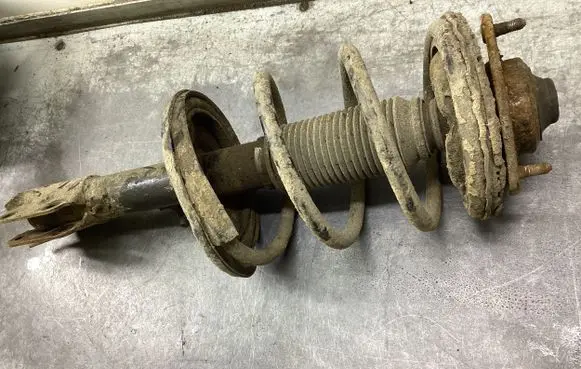 Mitsubishi Grandis Front shock absorber with coil spring