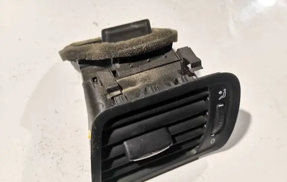Dash center air vent grill