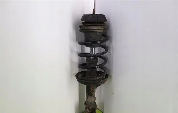 Opel Astra G Front shock absorber with coil spring 22171135