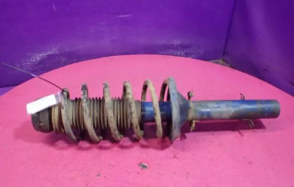 Volkswagen Golf IV Front shock absorber with coil spring
