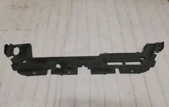 Engine bonnet/hood lock trim molding