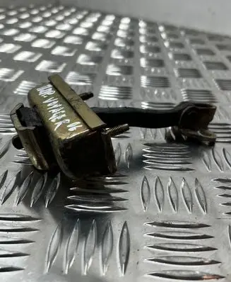 Front door check strap stopper